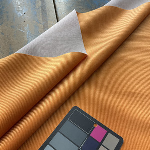 The Cord in Apricot | Upholstery Fabric | Corduroy in Solid Orange | Heavyweight | 54" Wide | By the Yard