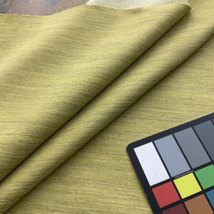 Hester in Split Pea | Upholstery Fabric | Striated Black on Chartreuse Green | 100% Polyester | Medium Weight | Nassimi | 54" Wide | By the Yard