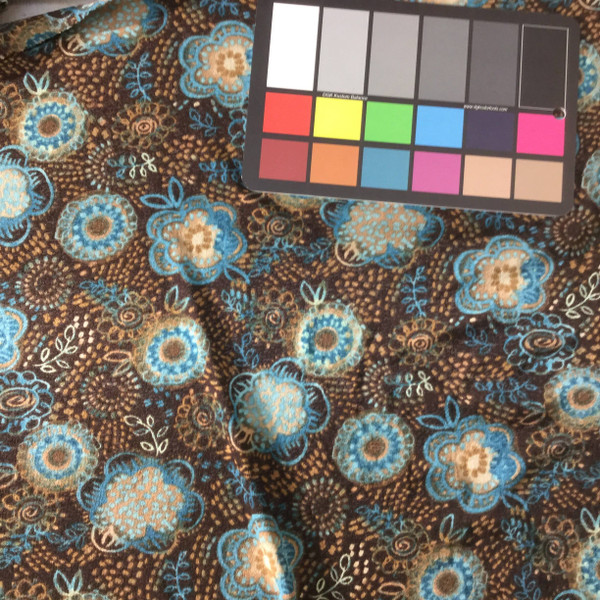 blue and brown floral sheer knit fabric