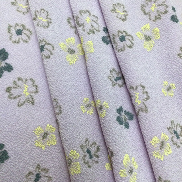 Rough Textured Scattered Gold Floral on Lavender Stretch Knit Fabric