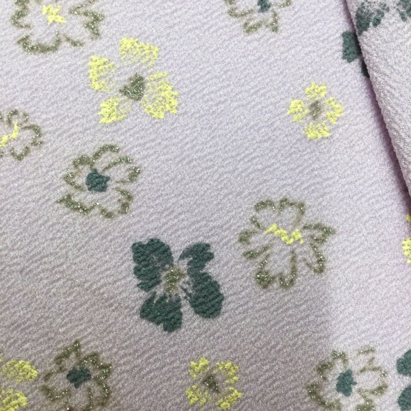 Rough Textured Scattered Gold Floral on Lavender Stretch Knit Fabric