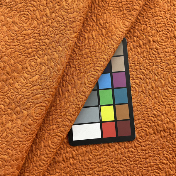 Mosaic in Citrus | Upholstery Fabric | Matelasse Quilted in Solid Burnt Orange | 100% Polyester  | Medium Weight | 54" Wide | Sold BTY