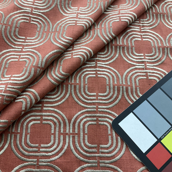 Chain Reaction in Cayenne | Drapery / Light Upholstery Fabric | Embroidered Circles in Tan on Brick Orange | P/K Lifestyles | 54" Wide | By the Yard