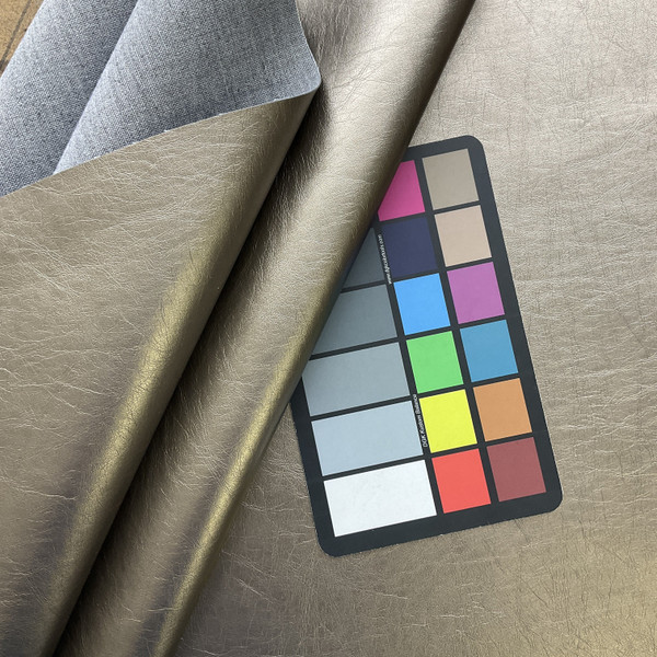Helsimo in Pewter | Faux Leather Vinyl Upholstery Fabric | Light Grain | Metallic | Workable | 54" Wide | By the Yard