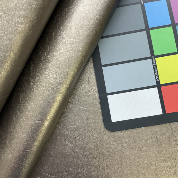 Helsimo in Pewter | Faux Leather Vinyl Upholstery Fabric | Light Grain | Metallic | Workable | 54" Wide | By the Yard