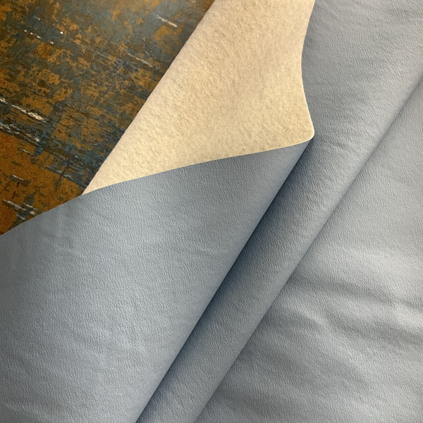 King in Blue | Warm Medium Sky Blue Textured Faux Leather Upholstery Vinyl Fabric | Midweight | Indoor Furniture |  Flannel Backed  | 54" Wide | Sold BTY