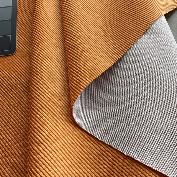 The Cord in Apricot | Upholstery Fabric | Corduroy in Solid Orange | Heavyweight | 54" Wide | By the Yard