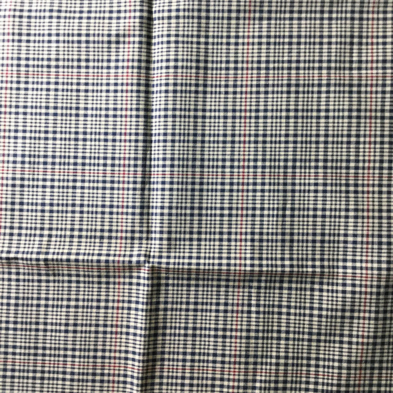 beige and navy with red plaid fabric