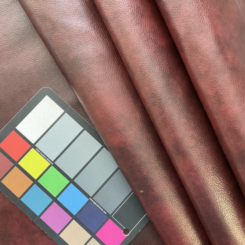 Oregon Trail in Bourbon Red Brown | Faux Leather Upholstery Fabric | Light Pebbled Grain | Vinyl | Heavy Weight / Durable | 54" Wide | By the Yard