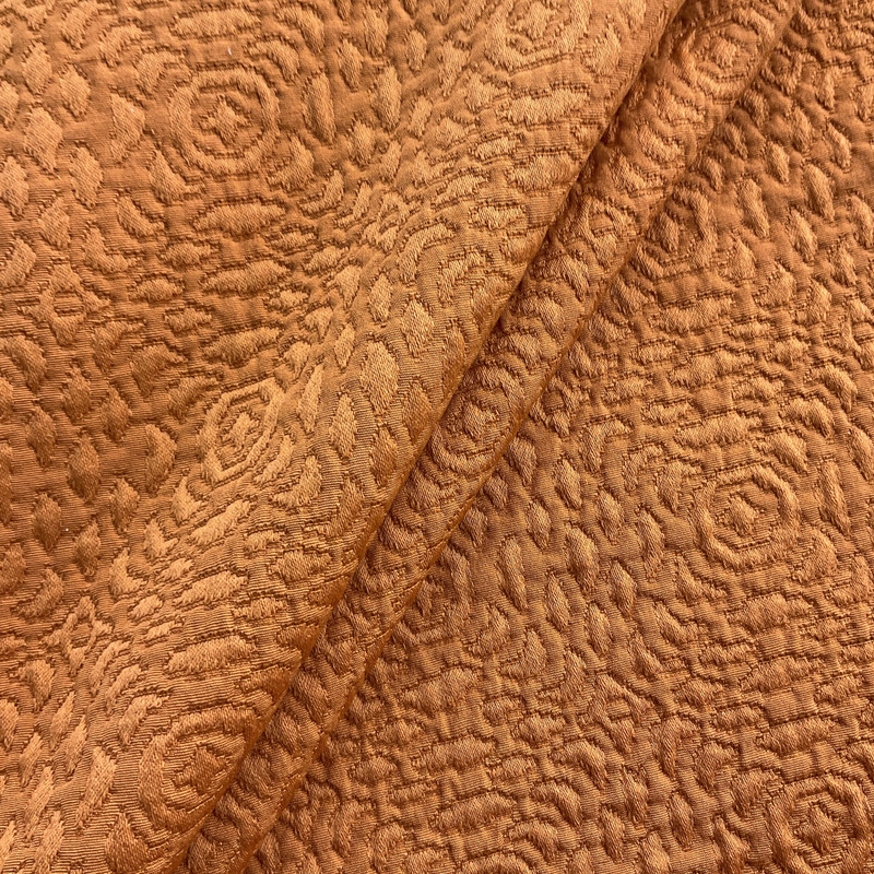 Mosaic in Citrus | Upholstery Fabric | Matelasse Quilted in Solid Burnt Orange | 100% Polyester  | Medium Weight | 54" Wide | Sold BTY