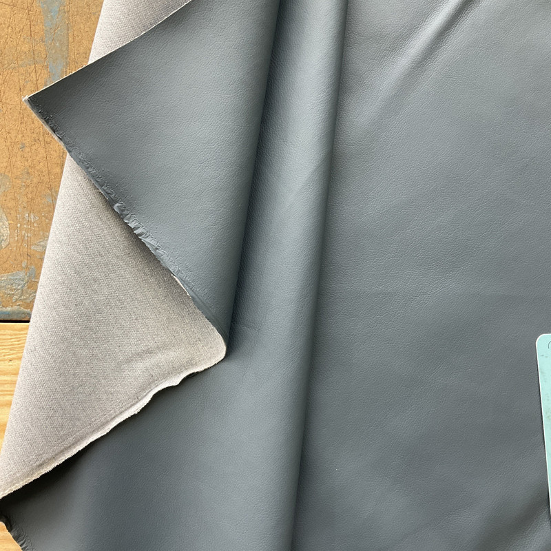 Pinnacle in Blue | Faux Leather Vinyl Upholstery Fabric | Light Pebbled Grain | Solid Navy Blue | 54" Wide | By the Yard