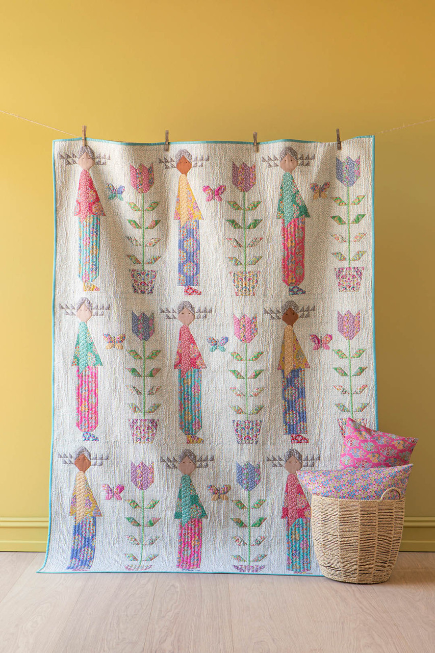 using quilts as curtains