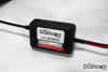 Red LED light on top of dash cam installation kit housing indicates proper operation