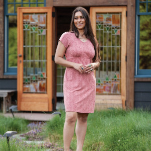 Woman standing outside wearing Bellamy Printed French Terry Dress in rose pink