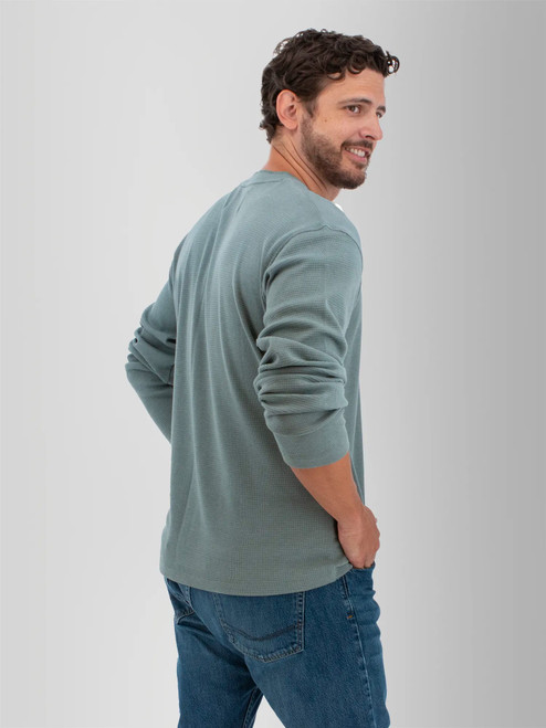 Rear right shoulder view of the Woodsman Waffle Crew Neck Tee in stormy sea blue.