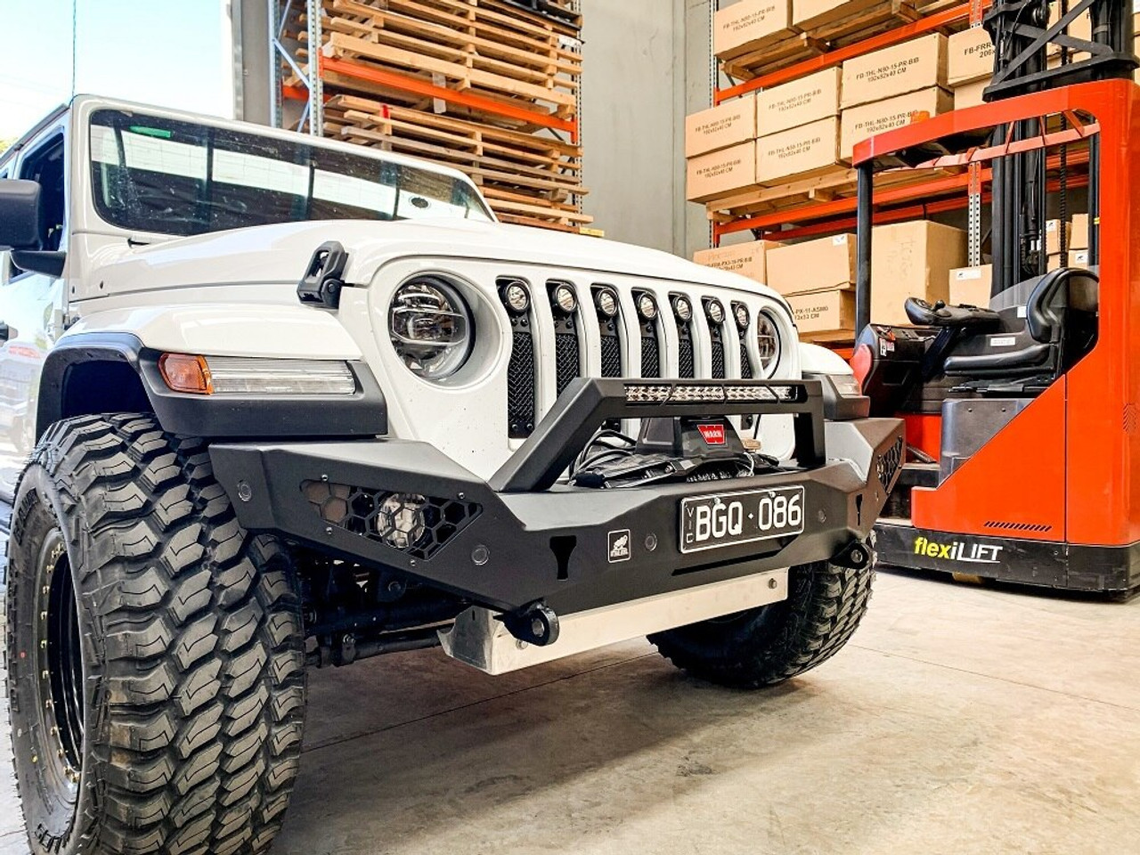 JL Predator bar fitting with optional winch, top hoop light and skid plate