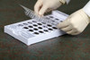 Put the blister into the tray, fill the blister with pills,  and then put the card on the blister to make the cold seal.