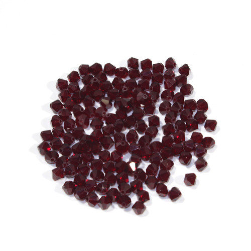 4mm Swarovski crystal bi-cone bead in color Garnet.