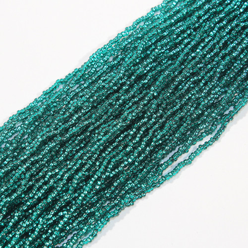 11/0 Silver Lined Teal Czech Seed Bead sold by the hank. 