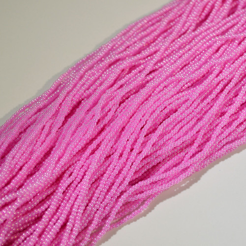 11/0 Pink Opaque Ceylon Czech Seed Bead sold by 1 hank. 