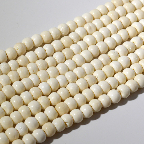 10mm Buffalo Bone Round Bead Strand | Natural Color 10mm Buffalo Bone Round Bead Strand | Natural Color