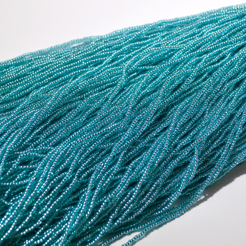 11/0 Silver Line Turquoise SOLGEL Czech Seed Bead sold by the hank. 