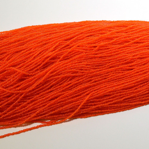 11/0 Dark Orange Transparent Czech Seed Bead | Hank