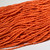 11/0 Permalux Orange Czech Seed Bead sold by the hank