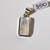 Rainbow Moonstone and sterling silver pendant 16x11mm