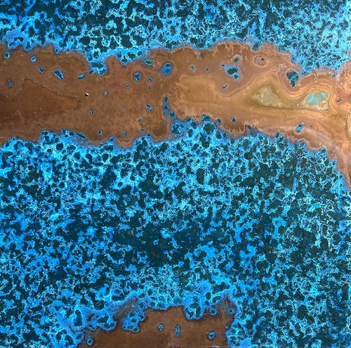 aged copper with areas of blue patina