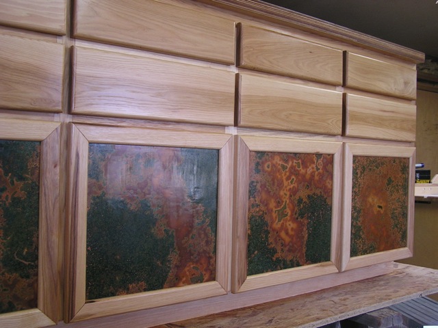 Kitchen Cabinets with Verde Patina Sheet Inserts