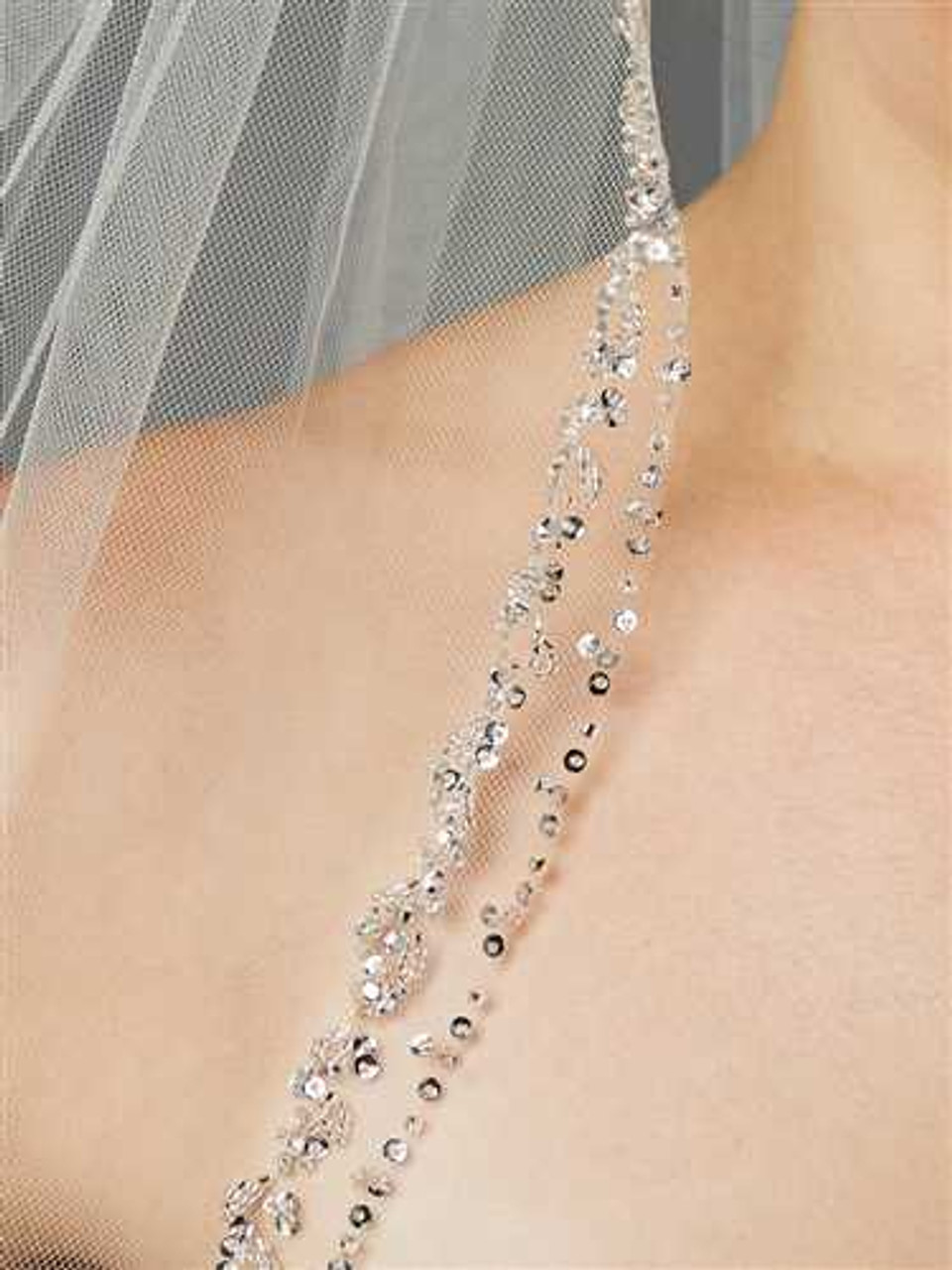 https://cdn11.bigcommerce.com/s-zb3qt33o/images/stencil/1280x1280/products/16902/58010/Glamorous-Beaded-Crystal-Fingertip-Length-Wedding-Veil_33233__58581.1688525065.jpg?c=2
