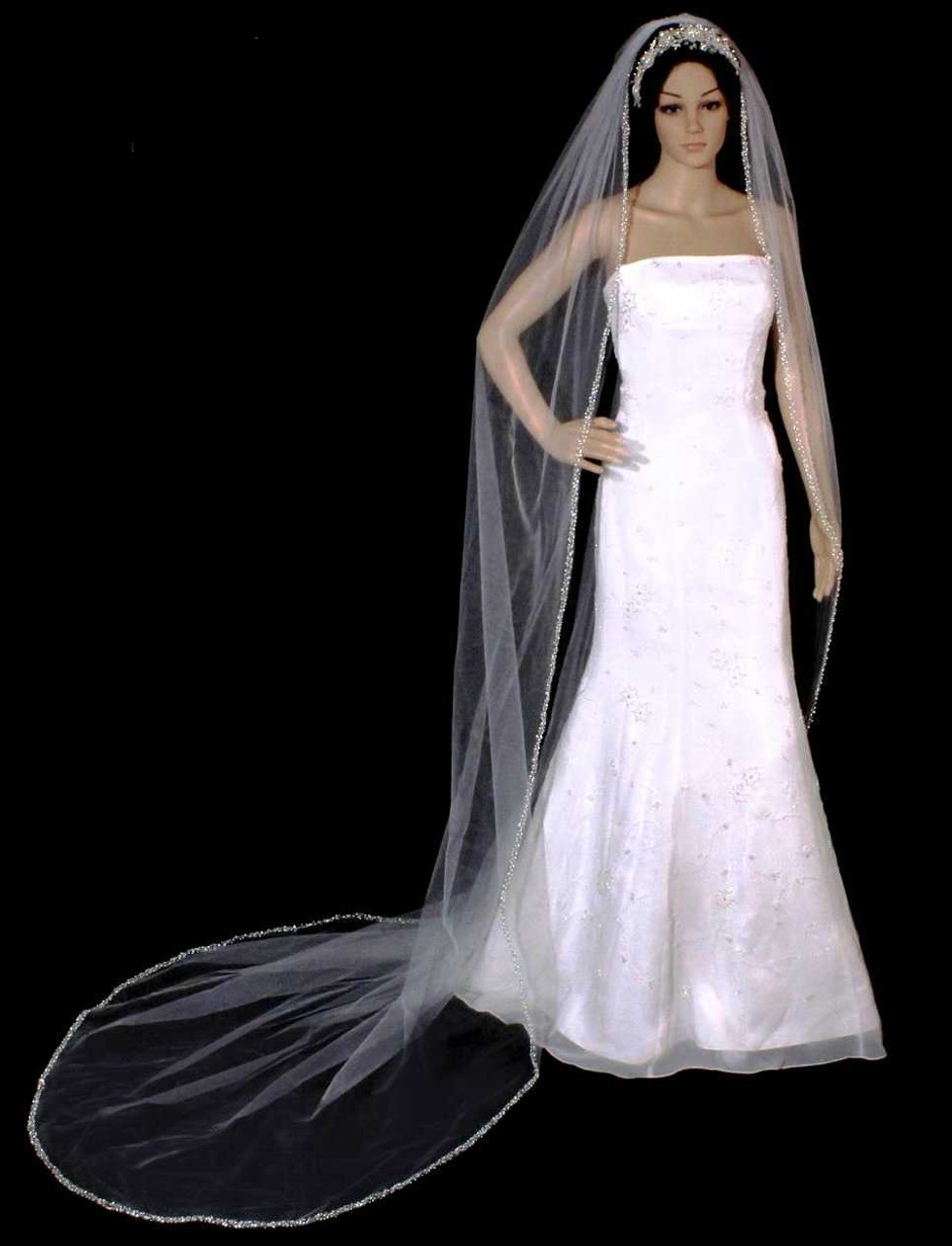 https://cdn11.bigcommerce.com/s-zb3qt33o/images/stencil/1280x1280/products/17271/56453/Cathedral-Length-Beaded-Pearl-and-Sequin-Wedding-Veil_35586__83719.1688168434.jpg?c=2