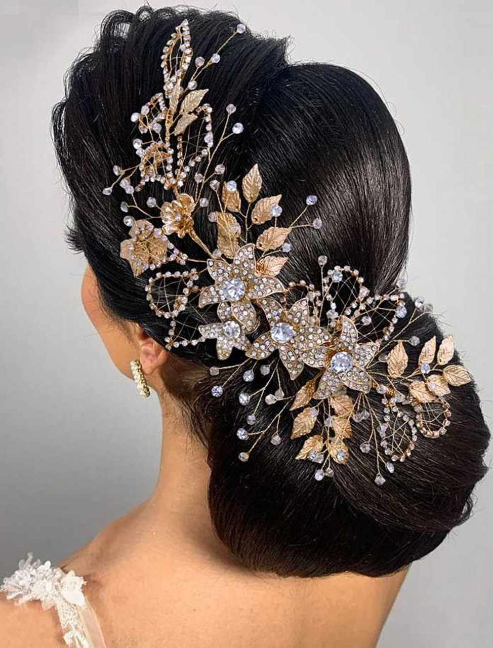 https://cdn11.bigcommerce.com/s-zb3qt33o/images/stencil/1280x1280/products/19435/58688/Large-Floral-Gold-Plated-Crystal-Wedding-Headpiece_50961__54583.1688664460.jpg?c=2