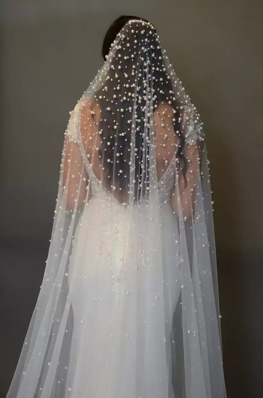 https://cdn11.bigcommerce.com/s-zb3qt33o/images/stencil/1280x1280/products/19737/59343/Pearl-Scatter-Royal-Cathedral-Wedding-Veil-Elena-Designs-E1371_53688__76089.1688908967.jpg?c=2