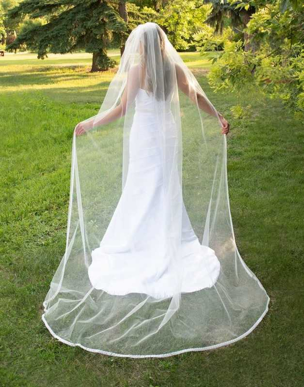 https://cdn11.bigcommerce.com/s-zb3qt33o/images/stencil/1280x1280/products/19922/63331/Cathedral-Wedding-Veil-with-Wide-Beaded-Pearl-Edge-CF281_62108__55690.1696201044.jpg?c=2