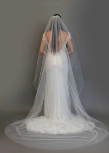 https://cdn11.bigcommerce.com/s-zb3qt33o/images/stencil/300x300/products/20052/66165/Cathedral-Wedding-Veil-with-Cut-Edge-Ansonia-Bridals-V217_66156__14185.1703275198.jpg?c=2
