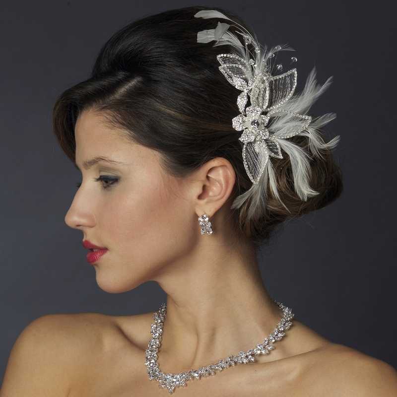 https://cdn11.bigcommerce.com/s-zb3qt33o/images/stencil/original/products/14530/61133/White-Feather-and-Rhinestone-Wedding-Hair-Comb_26029__84679.1689622709.jpg