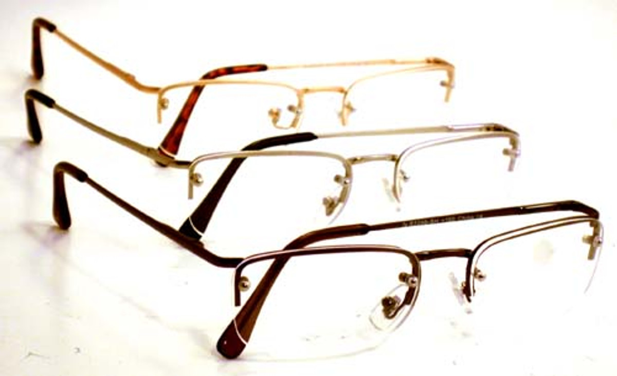 Clear bifocal reading glasses with a rimless bottom, spring hinge, metal frame