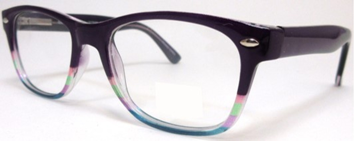 High end readers for small faces feature a deep dark purple plastic frame that fades to a blue and purple multi color bottom