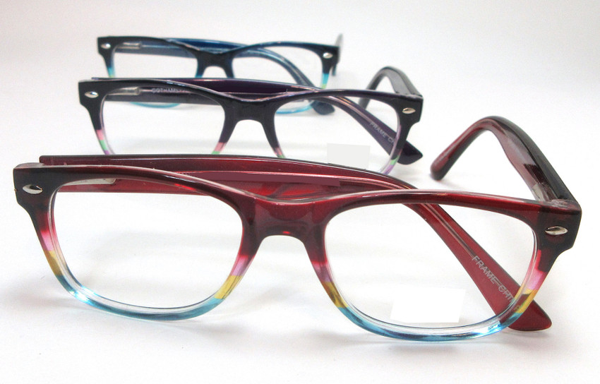 Colorful petite size reading glasses feature two tone color combos in purple, blue or red that fade to multi color on the frame bottom