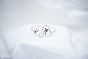 Octopus, Silver with 14K Gold Eyes Octopus, Silver with 14K Gold Eyes