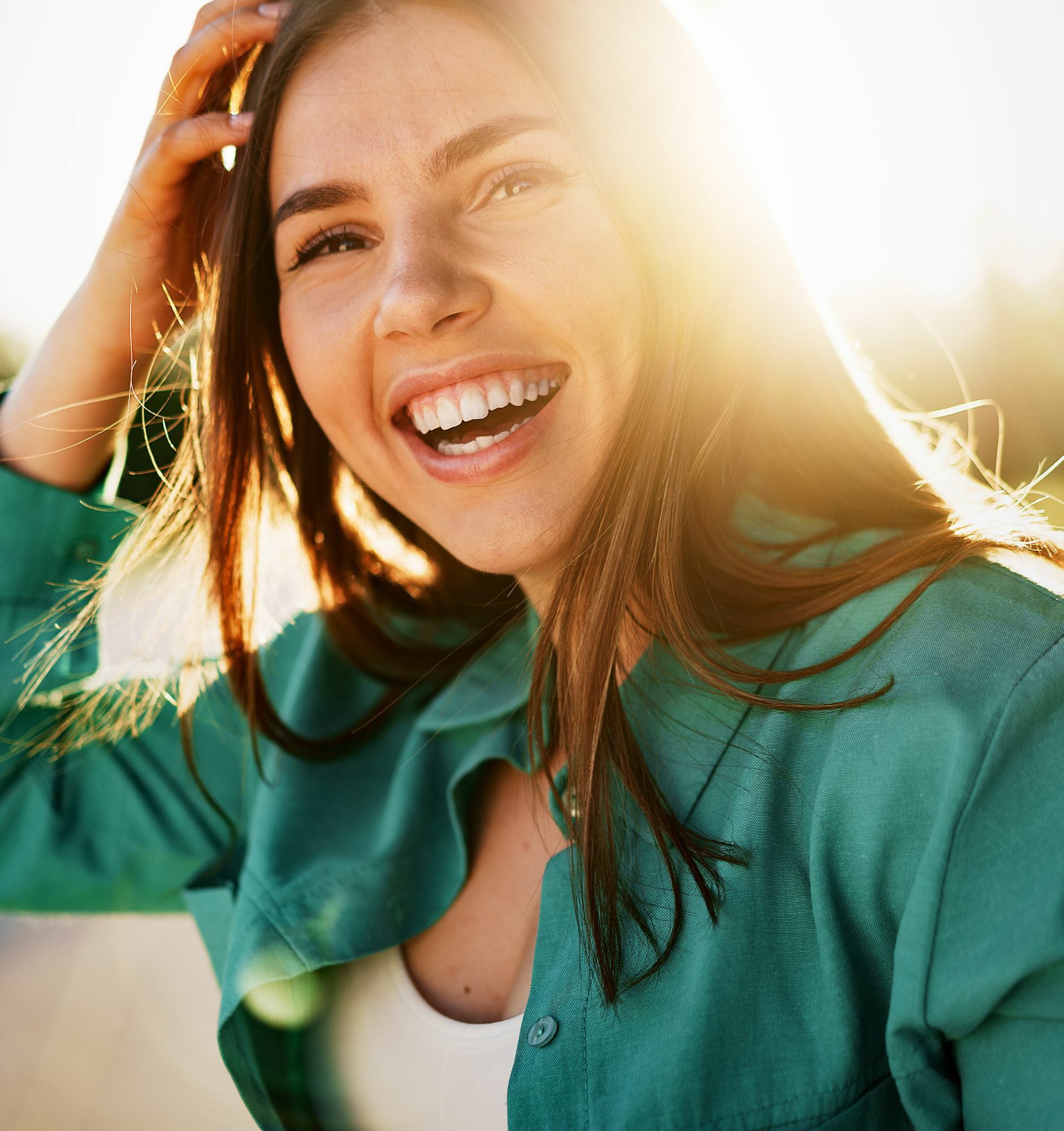 young woman smiling on sunny day