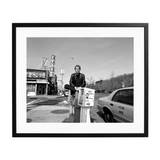 Anthony Bourdain at Katz's Deli Framed Print—The Late Bourdain Sitting On Top of a Newspaper Vending Machine Outside The New York Institution In 2008