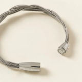12-String Guitar Woven Bracelet—Authentic Electric Guitar Strings Are Woven Together to Create a Sophisticated Bracelet That Still Knows How to Rock Out