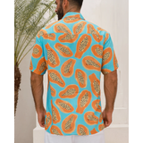 The Papaya Prix McLaren x Kenny Flowers—This Limited Edition Papaya-Print Hawaiian Shirt Is Ready to Pop Off and Celebrate With Champagne