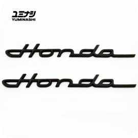 YUMINASHI BLACK LOWRIDER LOGO SET S600/S800 (2PCS/SET) FOR DAX, TRAIL & CHALY (75700-098-000ZB)