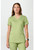 Cherokee Workwear Revolution Women's Mock Wrap Scrub Top and Flare Leg Scrub Pants - Cucumber