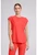 Med Couture AMP Women's Round Neck Tuckable Scrub Top - One In A Melon