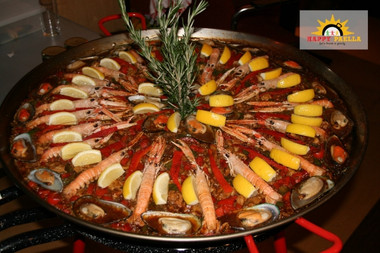 Recept paella mixta met gamba’s, mosselen, inktvis, verse chorizo en kip